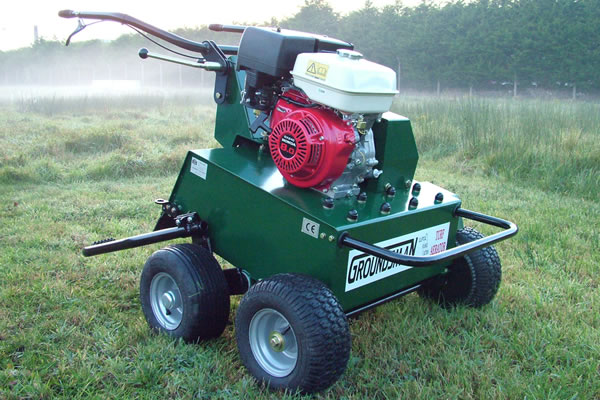 Pedestrian turf aerators